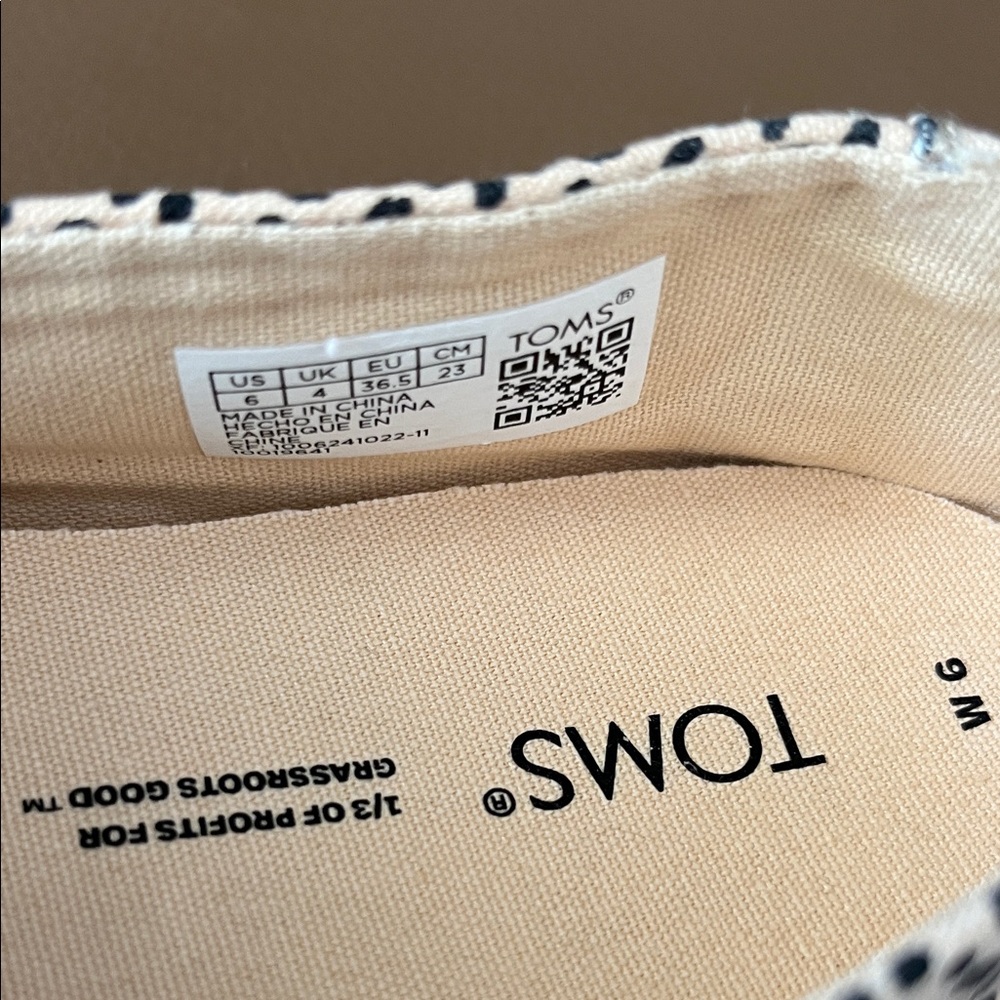 TOMS Women's Black and White Slip-On Shoes - Picture 2 of 4